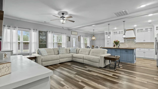2628 Laurens St, Grovetown, GA 30813 - living room featuring ceiling fan, wood finished floors, recessed lighting, and crown molding