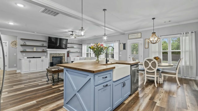 2628 Laurens St, Grovetown, GA 30813 - kitchen with butcher block counters, ceiling fan, a sink, dark wood-style floors, and healthy amount of natural light