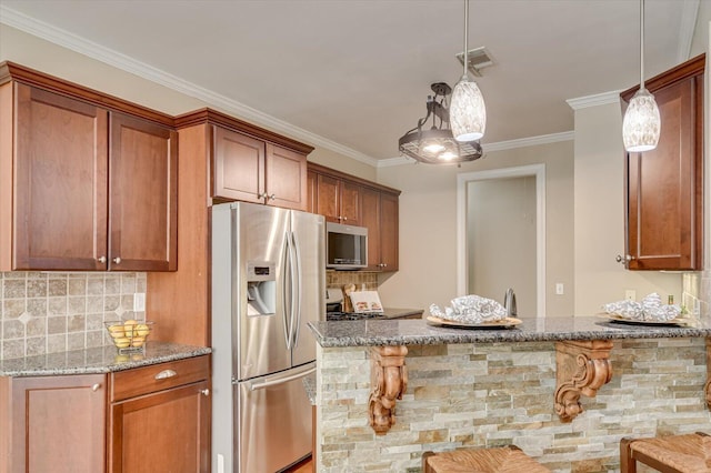 kitchen with light stone countertops, visible vents, appliances with stainless steel finishes, and brown cabinets