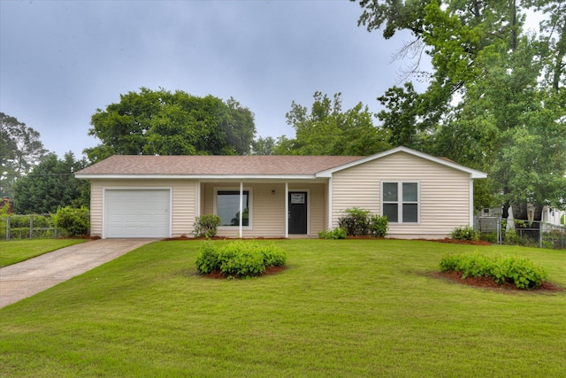 ranch-style home with a garage and driveway