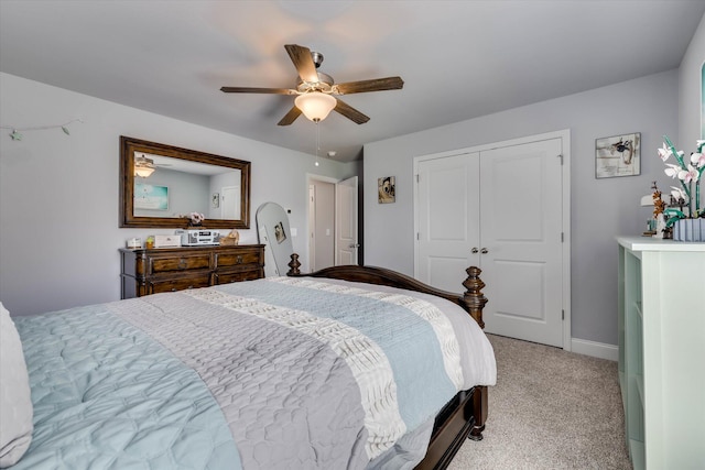 1856 Preservation Cir, Evans, GA 30809 - bedroom with light carpet, a closet, and a ceiling fan