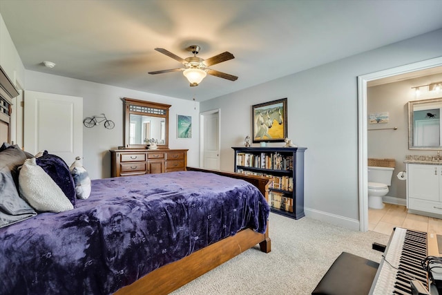 1856 Preservation Cir, Evans, GA 30809 - bedroom with ensuite bathroom, a ceiling fan, and light carpet