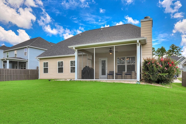 1856 Preservation Cir, Evans, GA 30809 - back of property featuring a sunroom, a ceiling fan, a chimney, and roof with shingles