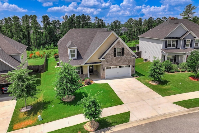 1856 Preservation Cir, Evans, GA 30809 - craftsman house featuring brick siding, driveway, an attached garage, and a shingled roof