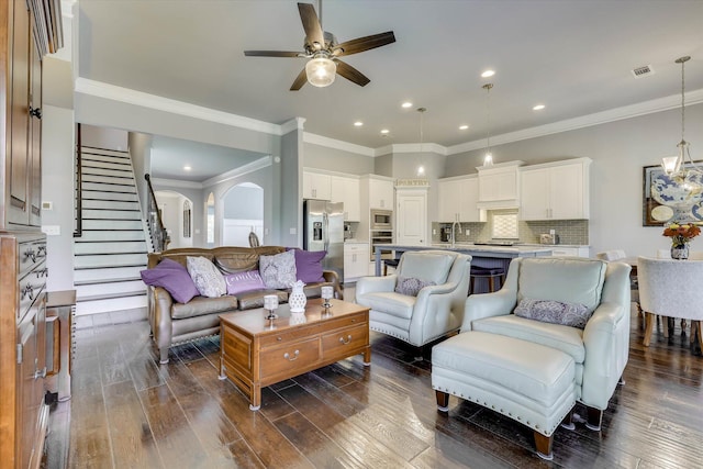 1856 Preservation Cir, Evans, GA 30809 - living area with ceiling fan, ornamental molding, dark wood-style floors, stairs, and recessed lighting