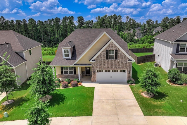 1856 Preservation Cir, Evans, GA 30809 - craftsman inspired home featuring brick siding, driveway, a front lawn, and an attached garage