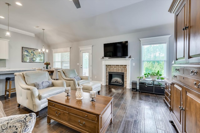 1856 Preservation Cir, Evans, GA 30809 - living room featuring dark wood finished floors, a fireplace, a chandelier, recessed lighting, and lofted ceiling