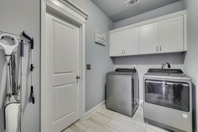1856 Preservation Cir, Evans, GA 30809 - washroom with washing machine and clothes dryer and cabinet space