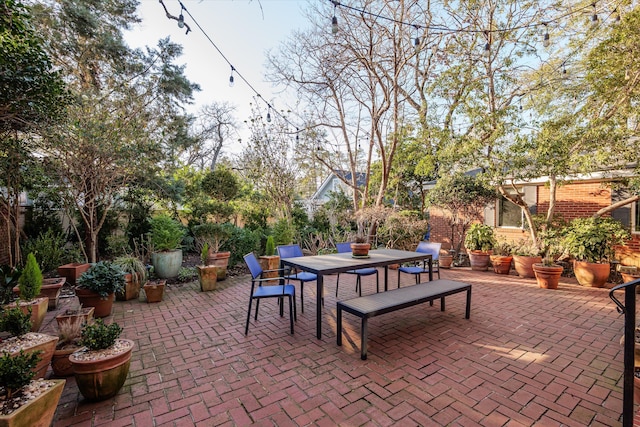 view of patio featuring outdoor dining area