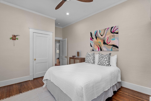 bedroom with ornamental molding, recessed lighting, wood finished floors, and baseboards