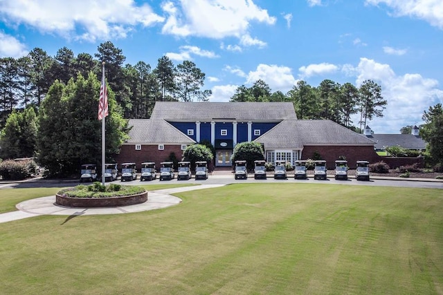 view of front of home with a front yard