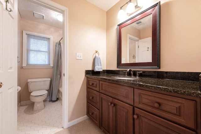 full bathroom with vanity, tile patterned flooring, shower / bath combination with curtain, and toilet