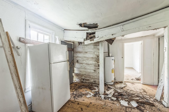 1843 Blairs Ln, Augusta, GA 30904 - kitchen with gas water heater and freestanding refrigerator