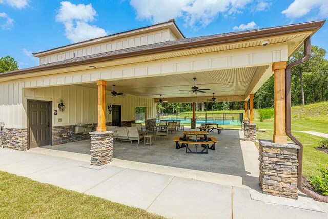 view of patio featuring a ceiling fan