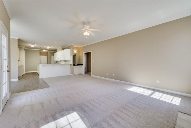 unfurnished living room with ornamental molding, light colored carpet, baseboards, and a ceiling fan