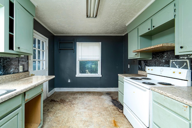 kitchen with white range with electric stovetop, green cabinets, decorative backsplash, and a textured ceiling