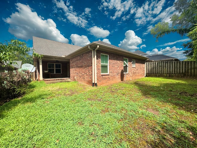 1026 Barrett Dr, Evans, GA 30809 - rear view of property with brick siding and roof with shingles