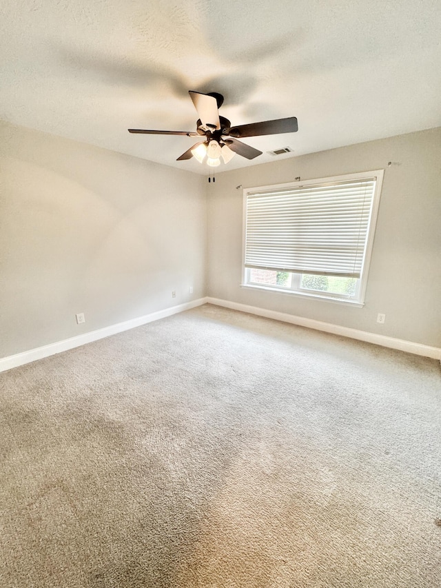 1026 Barrett Dr, Evans, GA 30809 - carpeted empty room featuring ceiling fan and a textured ceiling