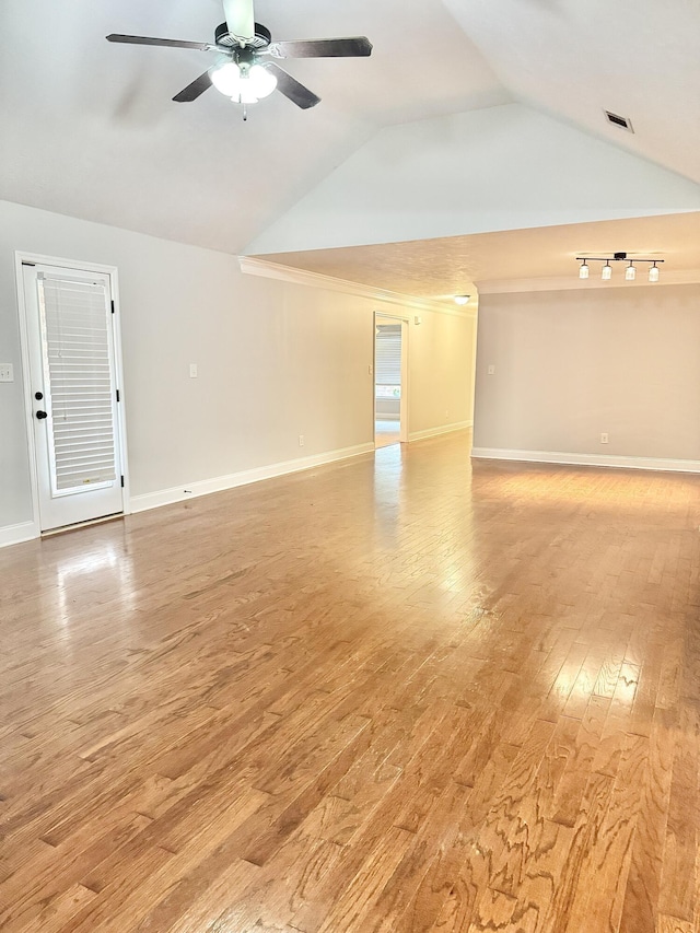 1026 Barrett Dr, Evans, GA 30809 - unfurnished room featuring a ceiling fan, vaulted ceiling, and light wood-style flooring