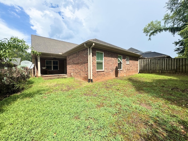 1026 Barrett Dr, Evans, GA 30809 - back of house with brick siding and a shingled roof