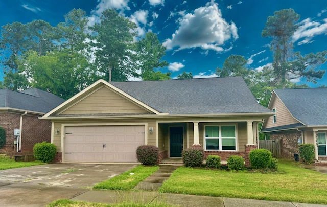 1026 Barrett Dr, Evans, GA 30809 - view of front facade with brick siding, concrete driveway, a garage, and a porch