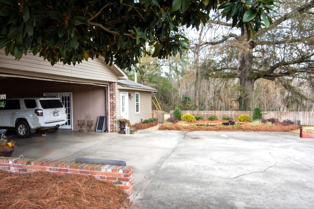 view of side of property featuring a garage