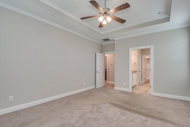 3109 Lobella Dr, Grovetown, GA 30813 - unfurnished bedroom with light colored carpet, a tray ceiling, baseboards, ornamental molding, and ensuite bath