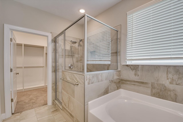 3109 Lobella Dr, Grovetown, GA 30813 - bathroom featuring a garden tub, a shower stall, a walk in closet, and recessed lighting