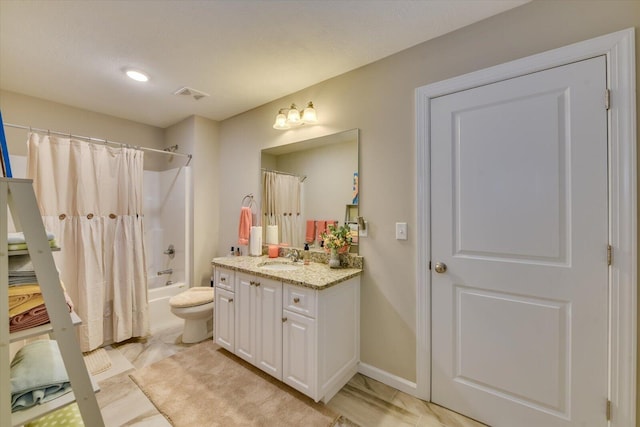 full bathroom featuring shower / bath combo, vanity, and toilet