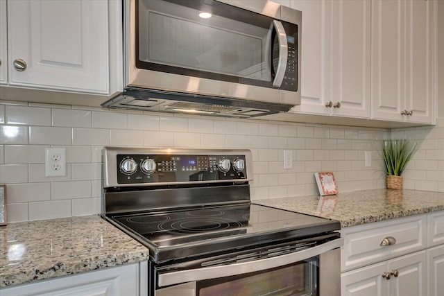 3109 Lobella Dr, Grovetown, GA 30813 - kitchen with appliances with stainless steel finishes, white cabinets, and backsplash