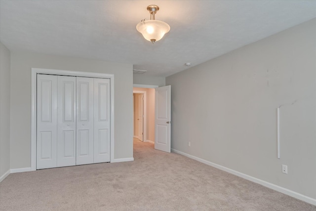 3109 Lobella Dr, Grovetown, GA 30813 - unfurnished bedroom with carpet, baseboards, and a closet