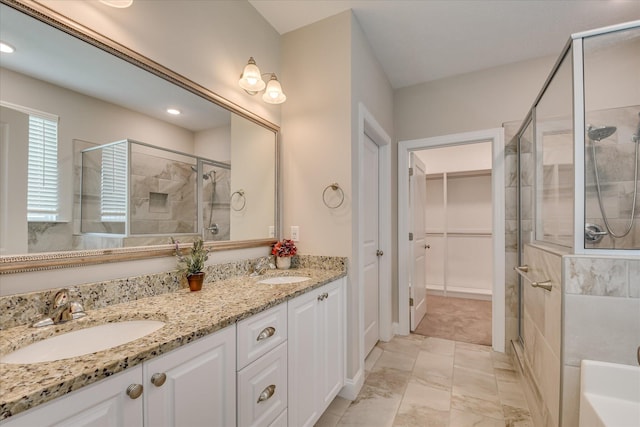 3109 Lobella Dr, Grovetown, GA 30813 - full bathroom with a shower stall, double vanity, a spacious closet, recessed lighting, and a tub