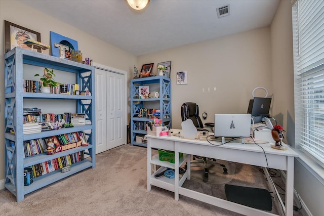 view of carpeted office space