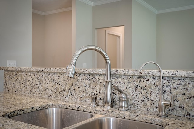 3109 Lobella Dr, Grovetown, GA 30813 - kitchen view of a sink, tasteful backsplash, crown molding, and light stone countertops