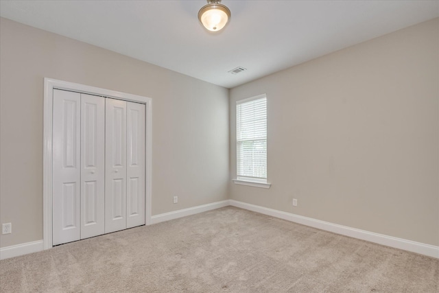 3109 Lobella Dr, Grovetown, GA 30813 - unfurnished bedroom featuring carpet, baseboards, and a closet