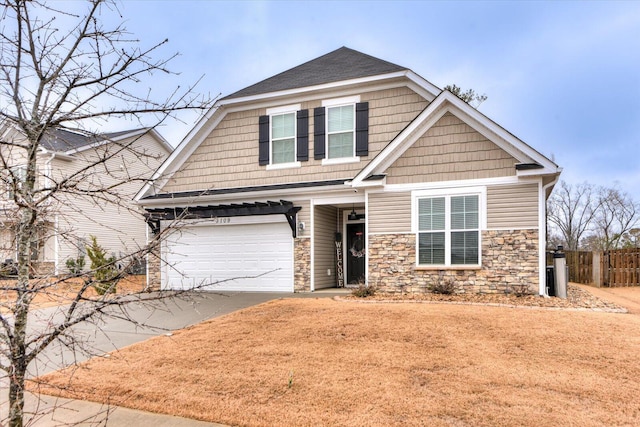 craftsman-style home with a garage