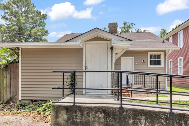209 Ellis St, Augusta, GA 30901 - view of front facade with a chimney and a shingled roof
