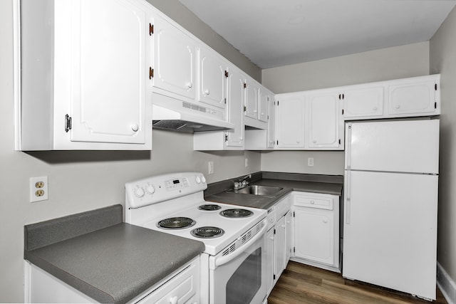 209 Ellis St, Augusta, GA 30901 - kitchen featuring white appliances, under cabinet range hood, white cabinets, and dark countertops