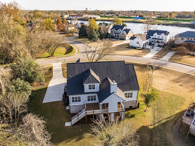 drone / aerial view with a water view