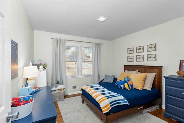 bedroom featuring light hardwood / wood-style floors