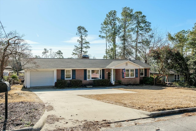 ranch-style home with a garage