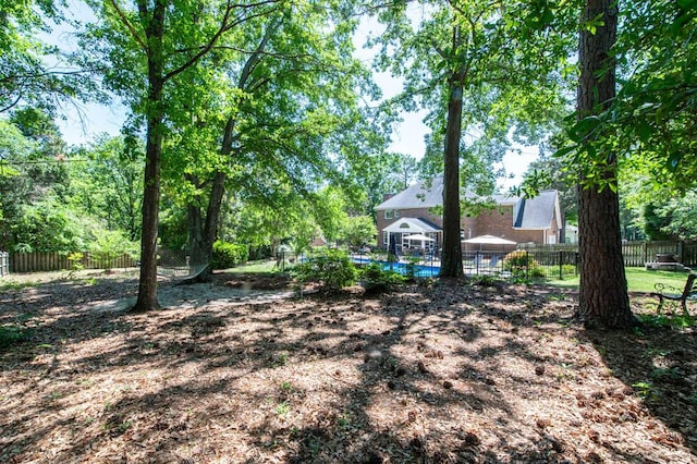 view of yard with fence