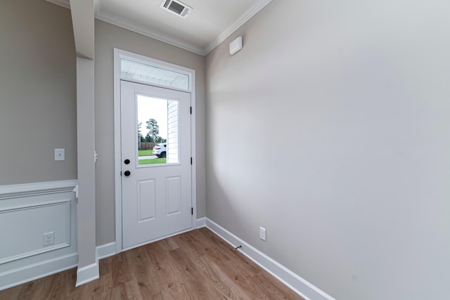 645 Jet Pass, Beech Island, SC 29842 - doorway featuring ornamental molding, light wood-style flooring, and baseboards