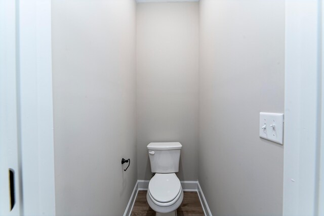 645 Jet Pass, Beech Island, SC 29842 - bathroom featuring baseboards, wood finished floors, and toilet