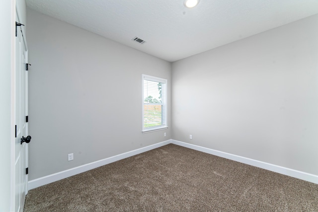 645 Jet Pass, Beech Island, SC 29842 - empty room with baseboards and dark carpet