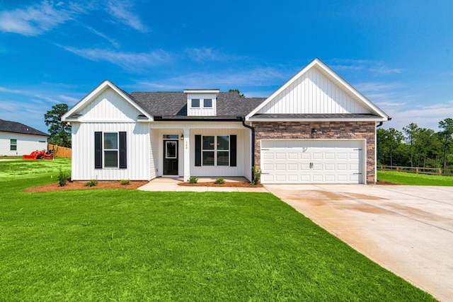 645 Jet Pass, Beech Island, SC 29842 - modern farmhouse style home featuring concrete driveway, a garage, board and batten siding, a shingled roof, and stone siding