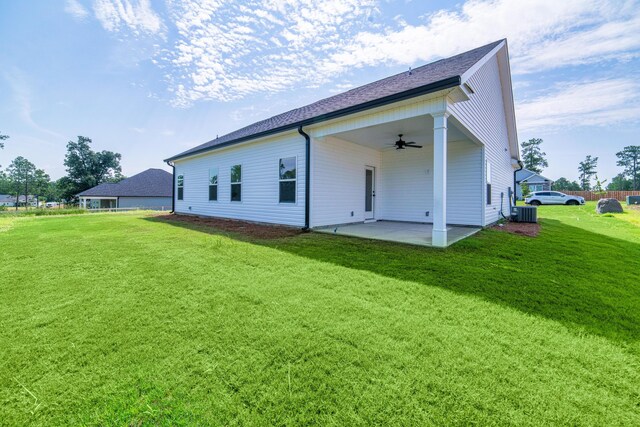 645 Jet Pass, Beech Island, SC 29842 - back of property with a ceiling fan, a patio, a yard, central AC, and roof with shingles