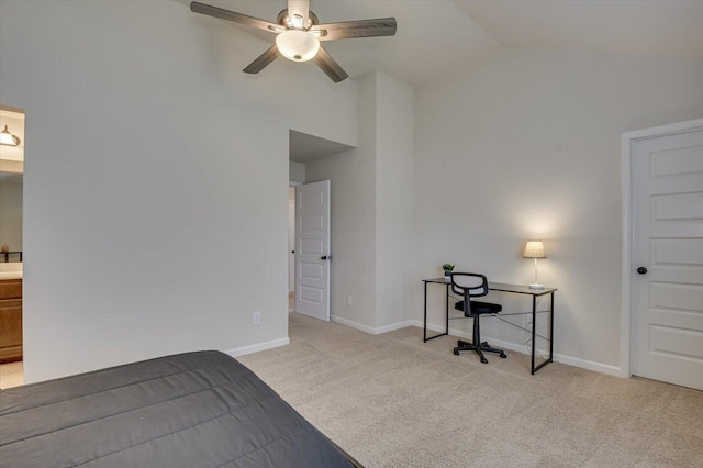 bedroom featuring connected bathroom, ceiling fan, light carpet, and vaulted ceiling