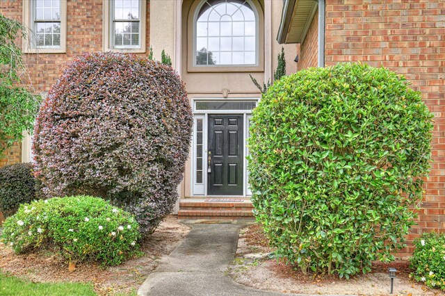 3696 El Cordero Ranch Springs Rd, Augusta, GA 30907 - view of exterior entry with brick siding and stucco siding