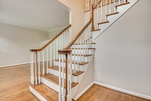 3696 El Cordero Ranch Springs Rd, Augusta, GA 30907 - staircase with wood finished floors, baseboards, and ornamental molding